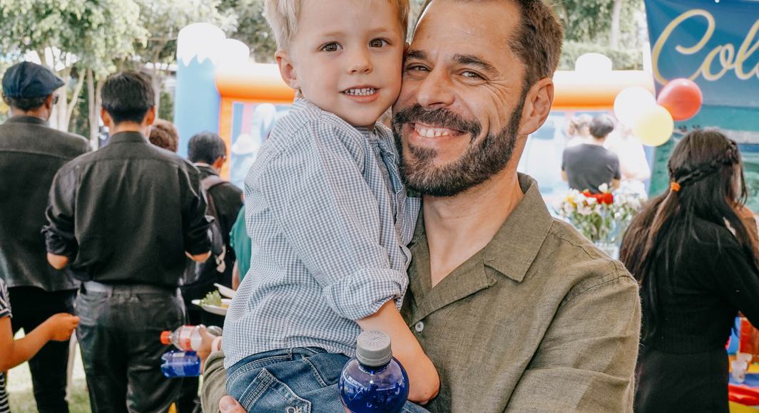 happy father and son at family fun day